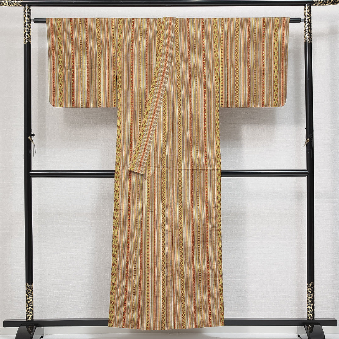 紬 単衣 身丈154cm 裄丈66cm 正絹 Sランク カジュアル バチ衿 Sサイズ 名物裂 薩摩間道 黄系 M4 1223-14773