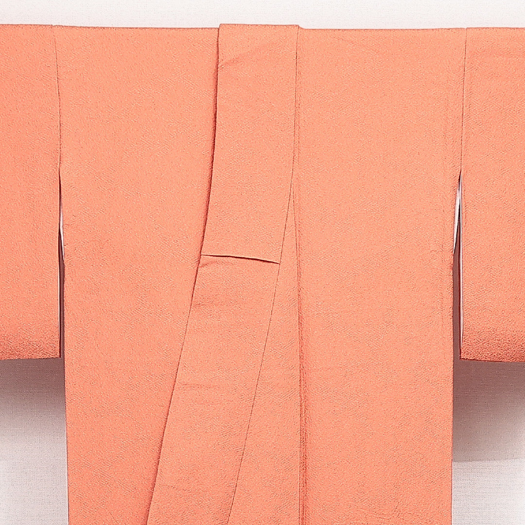 色無地 袷 身丈165cm 裄丈63cm 正絹 Sランク 一つ紋 (剣片喰) 紋意匠 (紗綾形) セミフォーマル 広衿 XLサイズ ふくれ織 ピンク系 RP 1219-14113