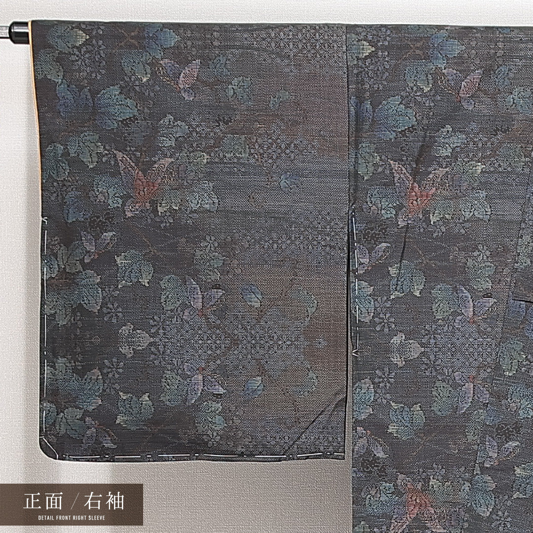 紬 袷 身丈167cm 裄丈64cm 正絹 Sランク カジュアル 広衿 XLサイズ 経緯絣 蝶 植物柄 黒系 M4 1223-14895