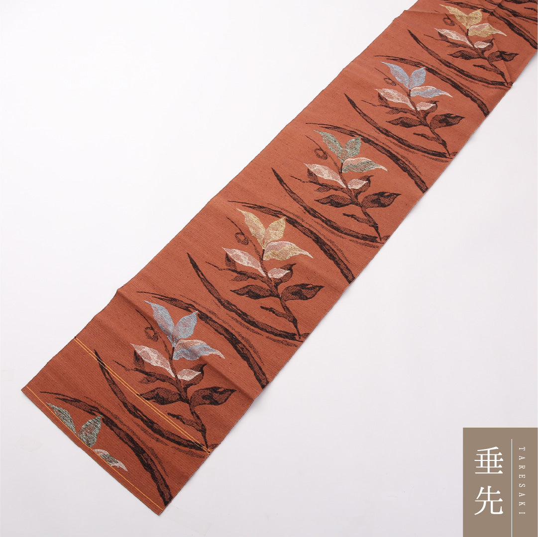 八寸名古屋帯 Sランク 帯丈320cm 正絹 六通 松葉仕立て 織り カジュアル 紬 唐草華文 朱系 HP 1245-02400