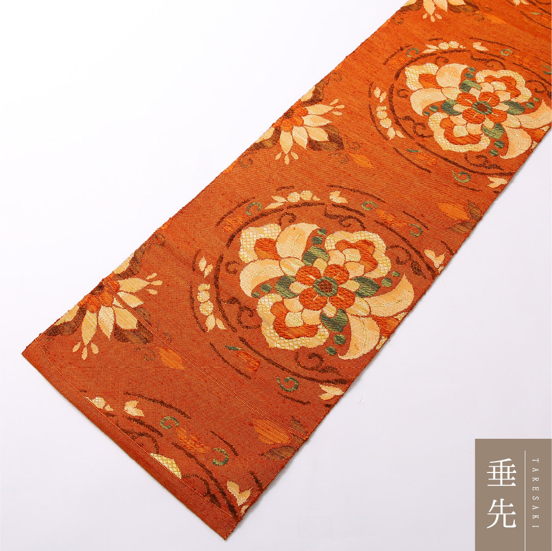 未使用品 八寸名古屋帯 Nランク 帯丈351cm 正絹 六通 松葉仕立て 織り カジュアル 紬 唐草華文 朱系 GP 1245-03041