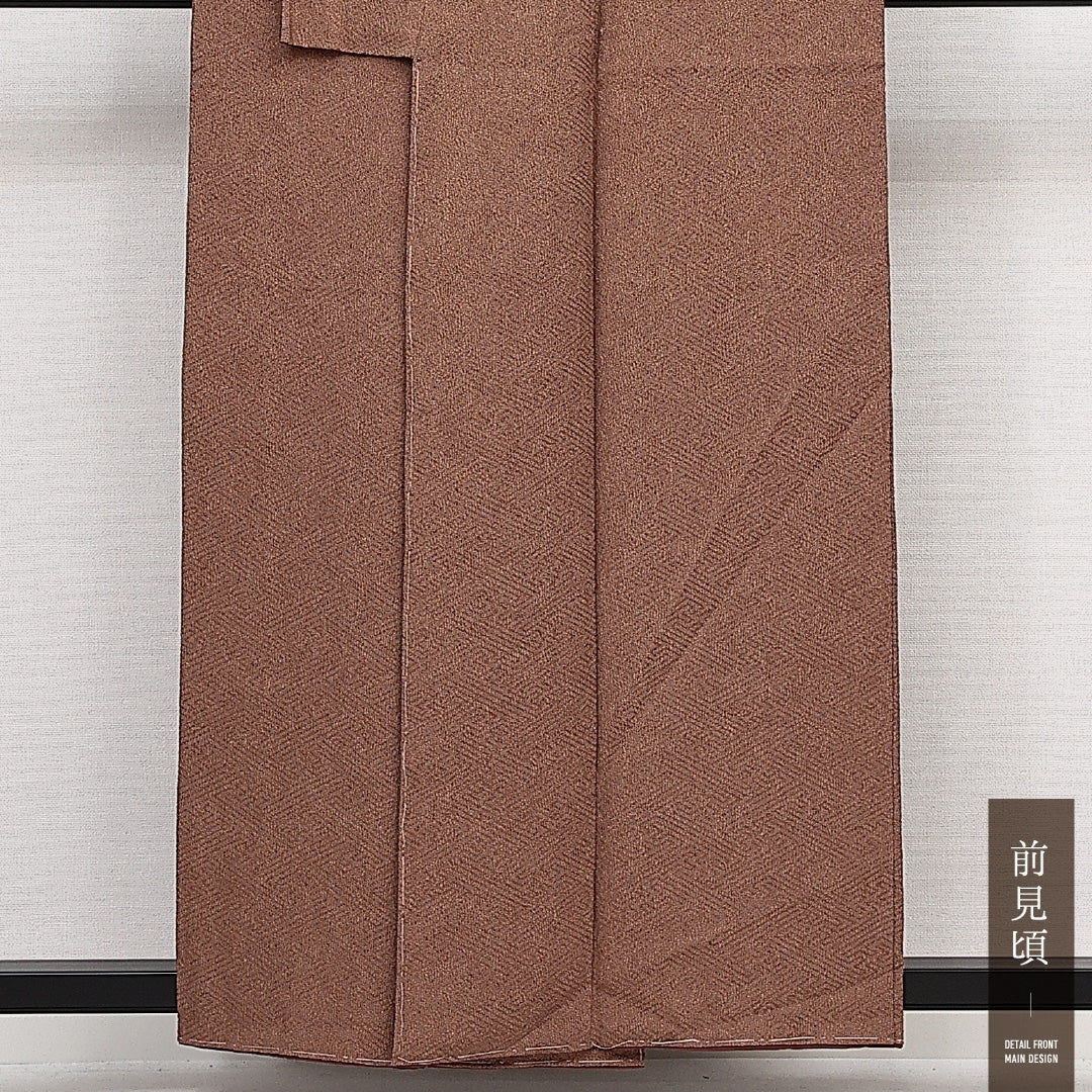 未使用品 江戸小紋 (鮫) 袷 身丈156cm 裄丈64cm 正絹 Nランク 一つ紋 (五三桐) 紋意匠 (紗綾形) セミフォーマル 広衿 Mサイズ 伊勢型 型染め しつけ糸 茶系 M4 1220-14056