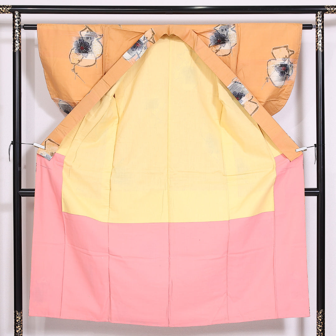 銘仙 紬 袷 身丈145cm 裄60cm 正絹 ボタニカル 朱系 しつけ糸 Cランク 1216-01486