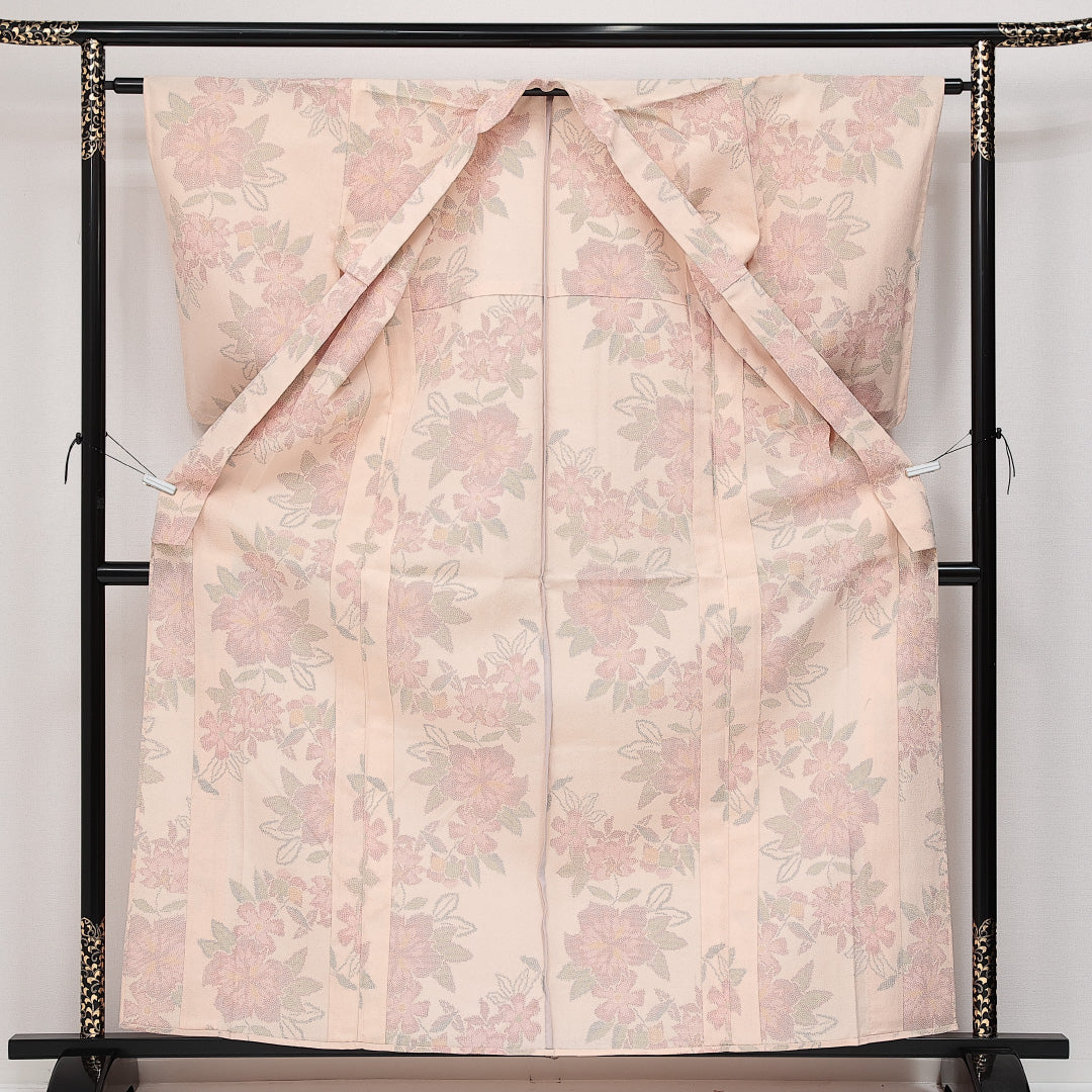 未使用品 紬 単衣 身丈161cm 裄丈62cm 正絹 Sランク カジュアル バチ衿 Lサイズ 織り出し しつけ糸 花柄 ピンク系 RP 1223-14317