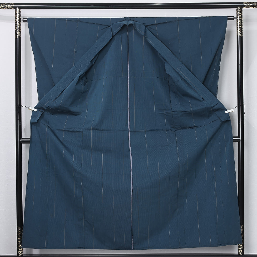 未使用品 紬 単衣 身丈158cm 裄丈61cm 正絹 Nランク カジュアル バチ衿 Mサイズ 漆糸 しつけ糸 抽象柄 緑系 M4 1223-12297