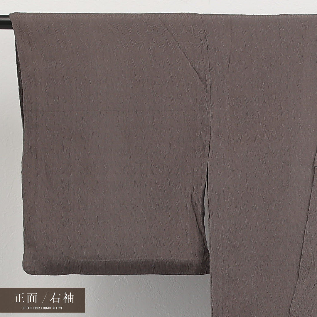 色無地 単衣 身丈140cm 裄丈64cm 正絹 Cランク 一つ紋 (中陰五三桐) 紋意匠 (抽象柄) セミフォーマル バチ衿 Lサイズ ふくれ織 無地 茶系 RP 1219-17313