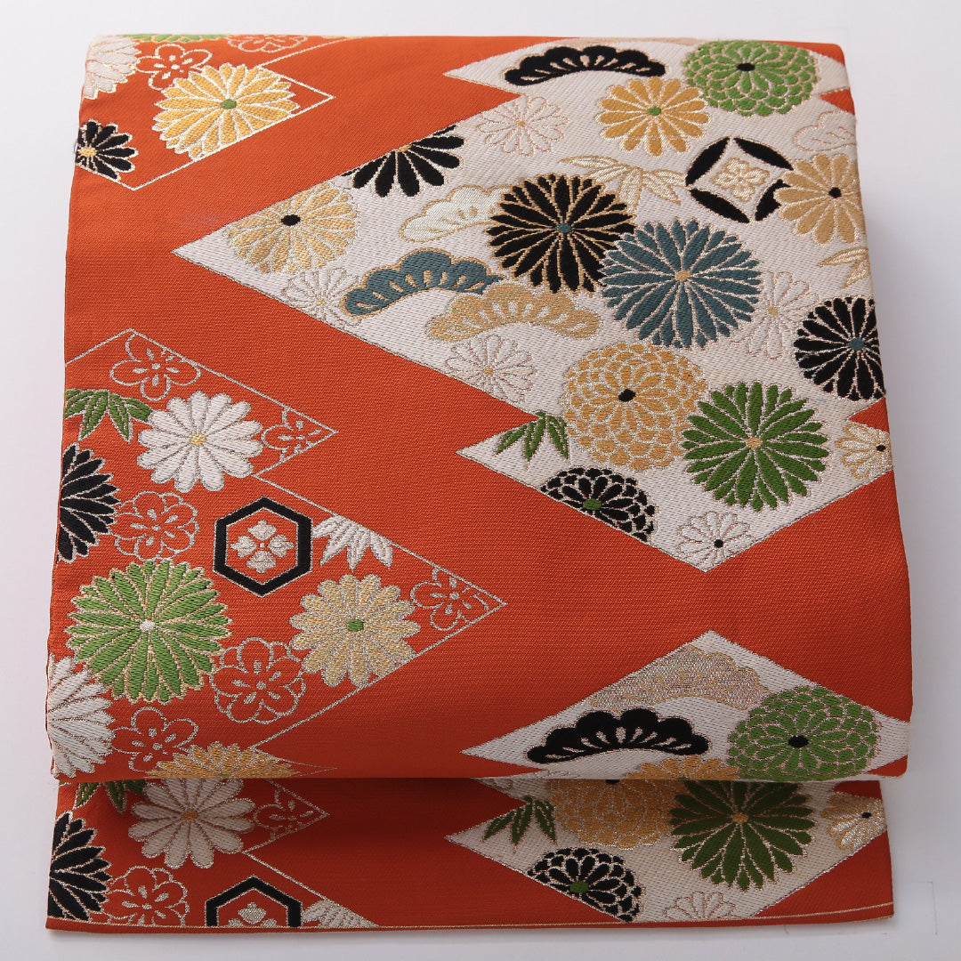 九寸名古屋帯 帯丈335cm カジュアル 名古屋仕立て 六通 Cランク 正絹 松皮菱 菊 松葉 朱系 1224-03602