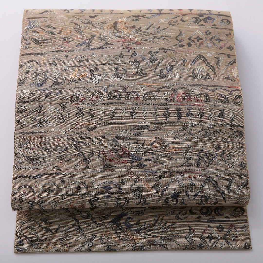 八寸名古屋帯 帯丈357cm カジュアル 名古屋仕立て 六通 帯芯なし Cランク 正絹 創作柄 ベージュ系 1224-03541