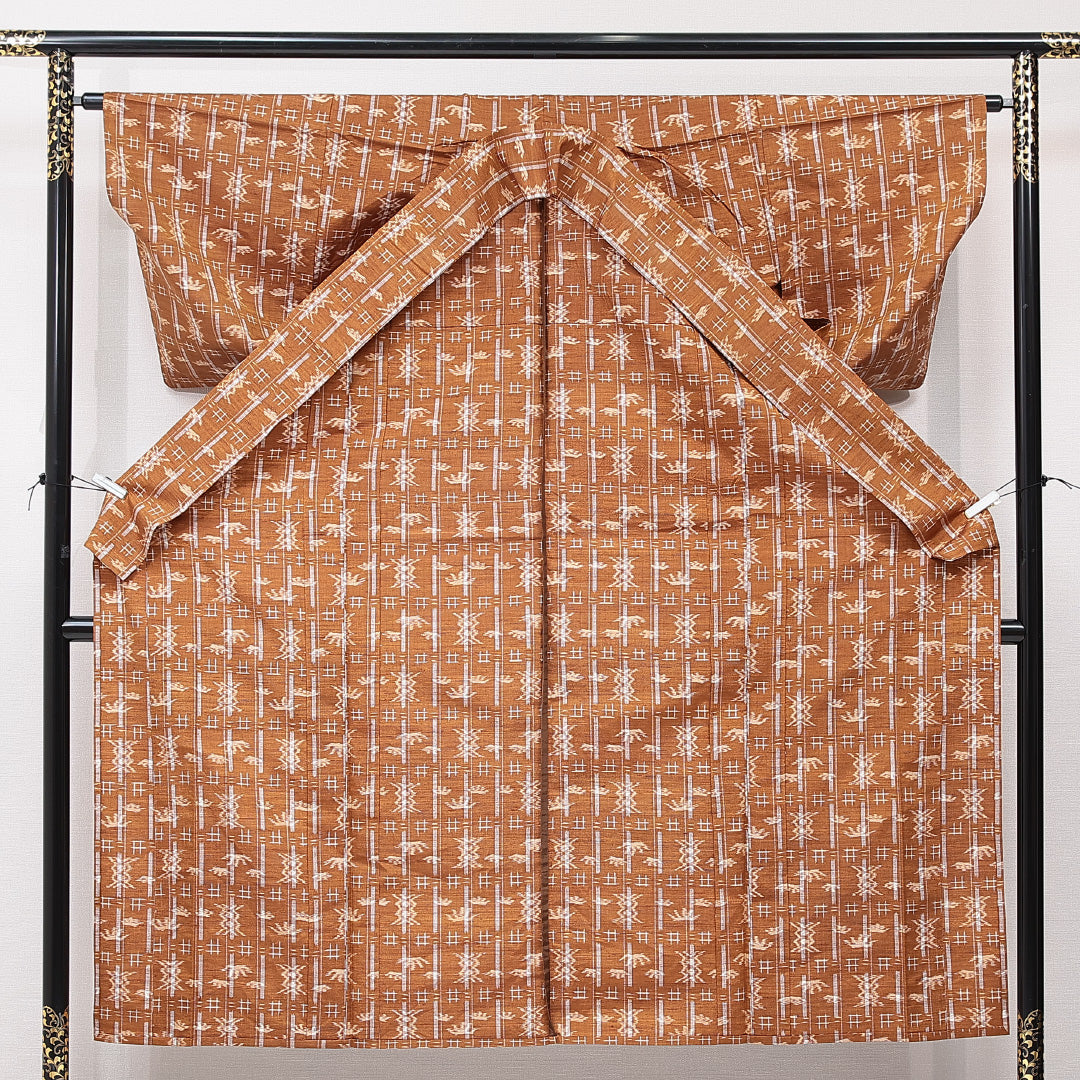 紬 単衣 身丈149cm 裄丈62cm 正絹 Sランク カジュアル 広衿 XSサイズ 十字絣 創作柄 茶系 RP 1223-15330