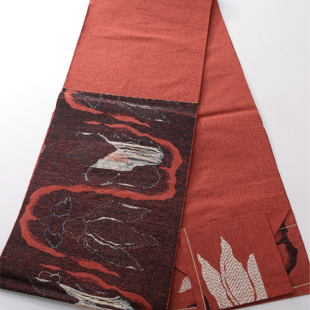 八寸名古屋帯（紬） 帯丈348cm カジュアル 松葉仕立て 六通 Cランク 正絹 花柄 赤系 朱系 1224-03820