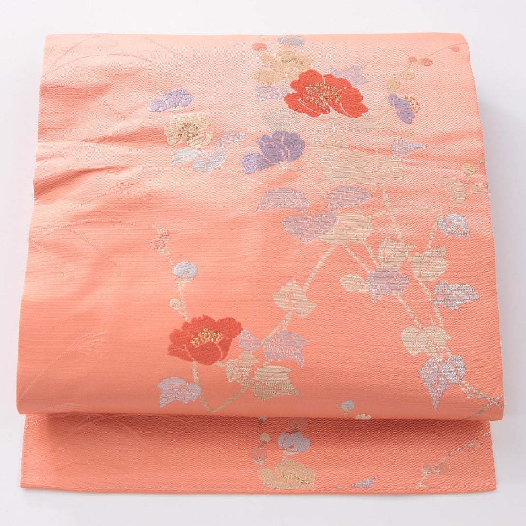 未使用品 九寸名古屋帯 Nランク 帯丈354cm 正絹 六通 名古屋仕立て 織り インフォーマル 花柄 朱の混ざったピンク系 RP 1245-04152