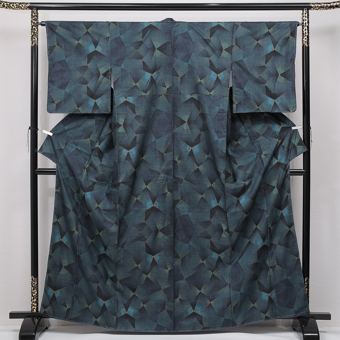 未使用品 大島紬 袷 身丈164cm 裄丈65cm 正絹 Nランク インフォーマル 広衿 Lサイズ 経緯絣 ガード加工 しつけ糸 幾何学柄 青系 PO 1223-15044