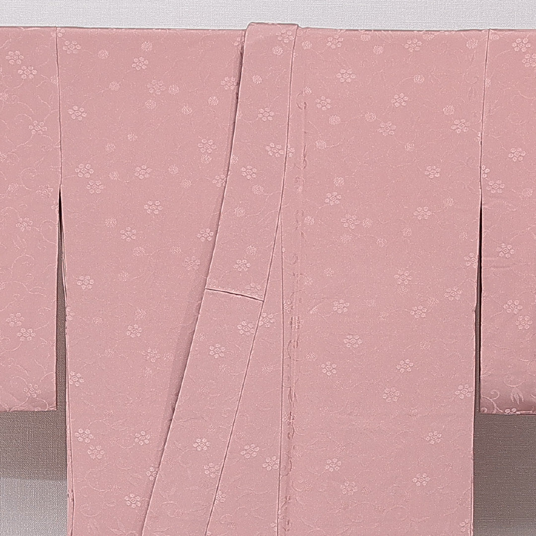 色無地 袷 身丈162cm 裄丈65cm 正絹 Aランク Lサイズ バチ衿 一つ紋（五三桐） セミフォーマル 紋意匠 梅鉢 織り出し ピンク系 1214-15650