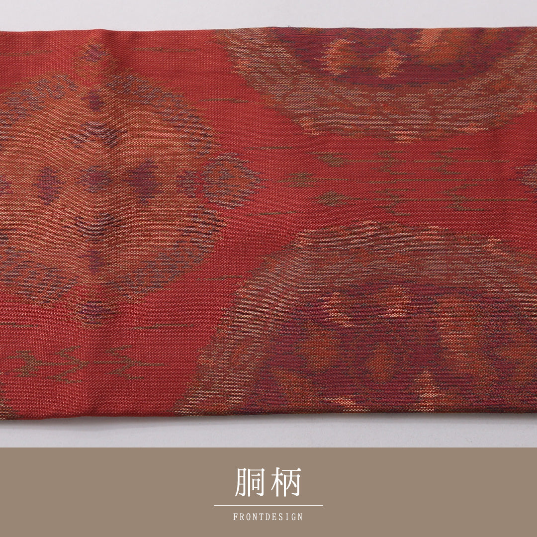 九寸名古屋帯 帯丈357cm カジュアル 名古屋仕立て 六通 Aランク 正絹 創作柄 赤系 朱系 1224-03501