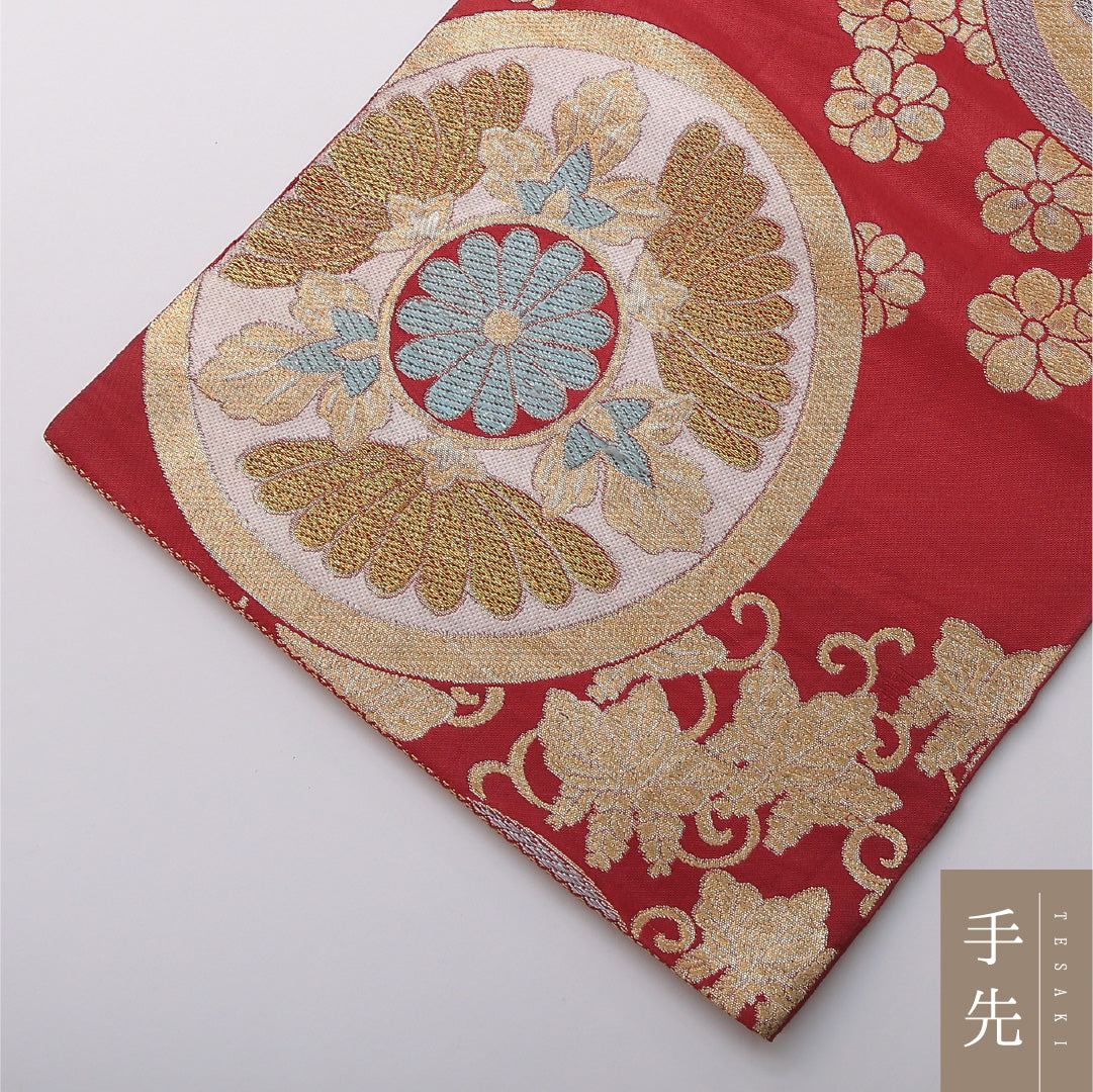 九寸名古屋帯 帯丈396cm セミフォーマル 開き仕立て 六通 Cランク 正絹 有職文様 赤系 1224-03499