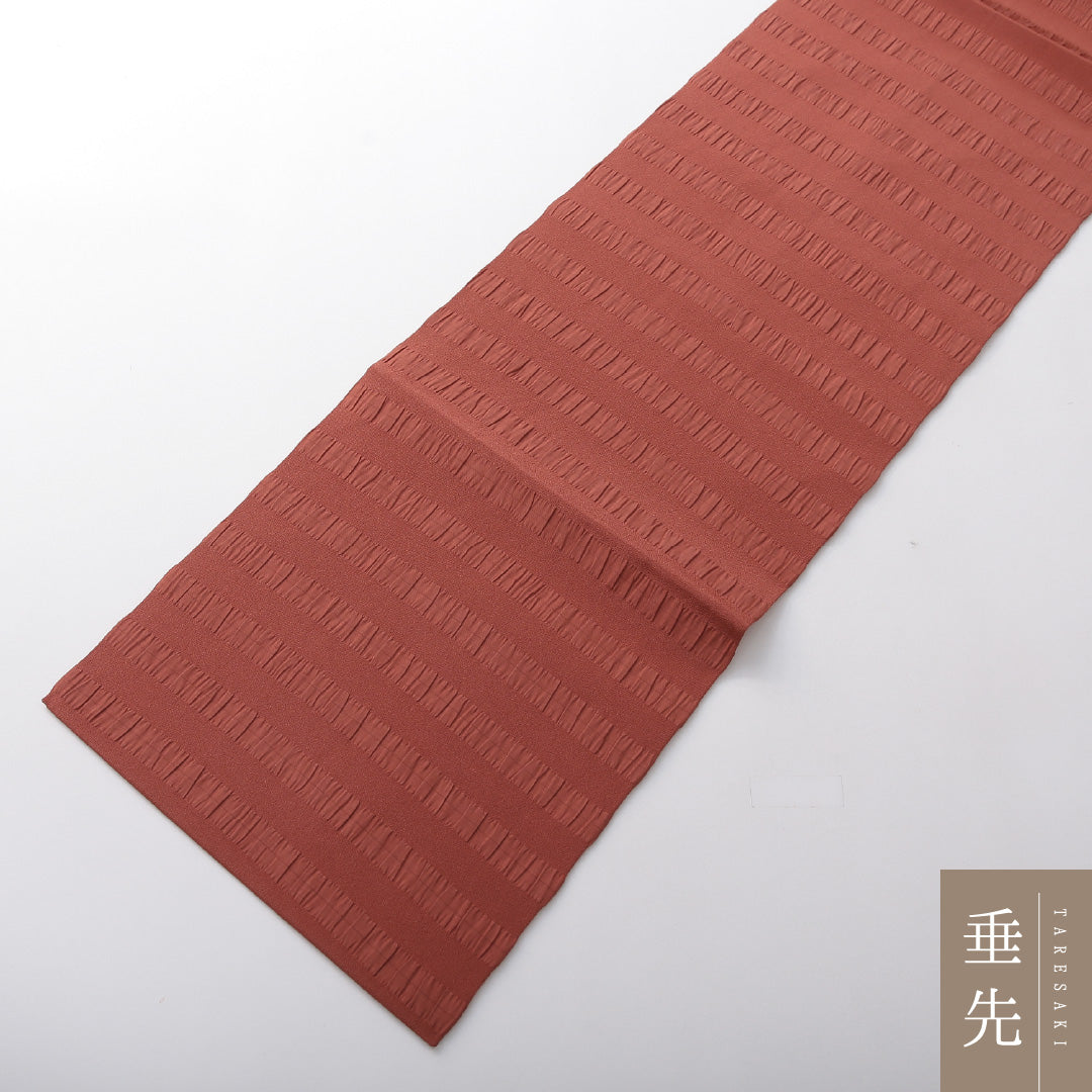 未使用品 九寸名古屋帯 Nランク 帯丈333cm 正絹 全通 名古屋仕立て 織り カジュアル しつけ糸 ふくれ織 創作柄 くすんだピンク系 HP 1245-03709