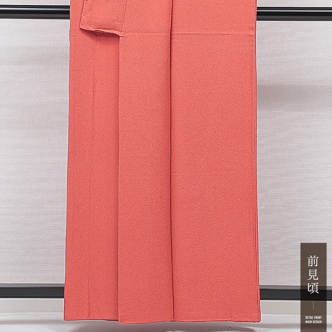 色無地 袷 身丈159cm 裄丈65cm 正絹 Sランク Mサイズ 広衿 一つ紋（丸に桔梗） セミフォーマル 紋意匠 創作柄 織り出し 赤系 朱系 1214-15653