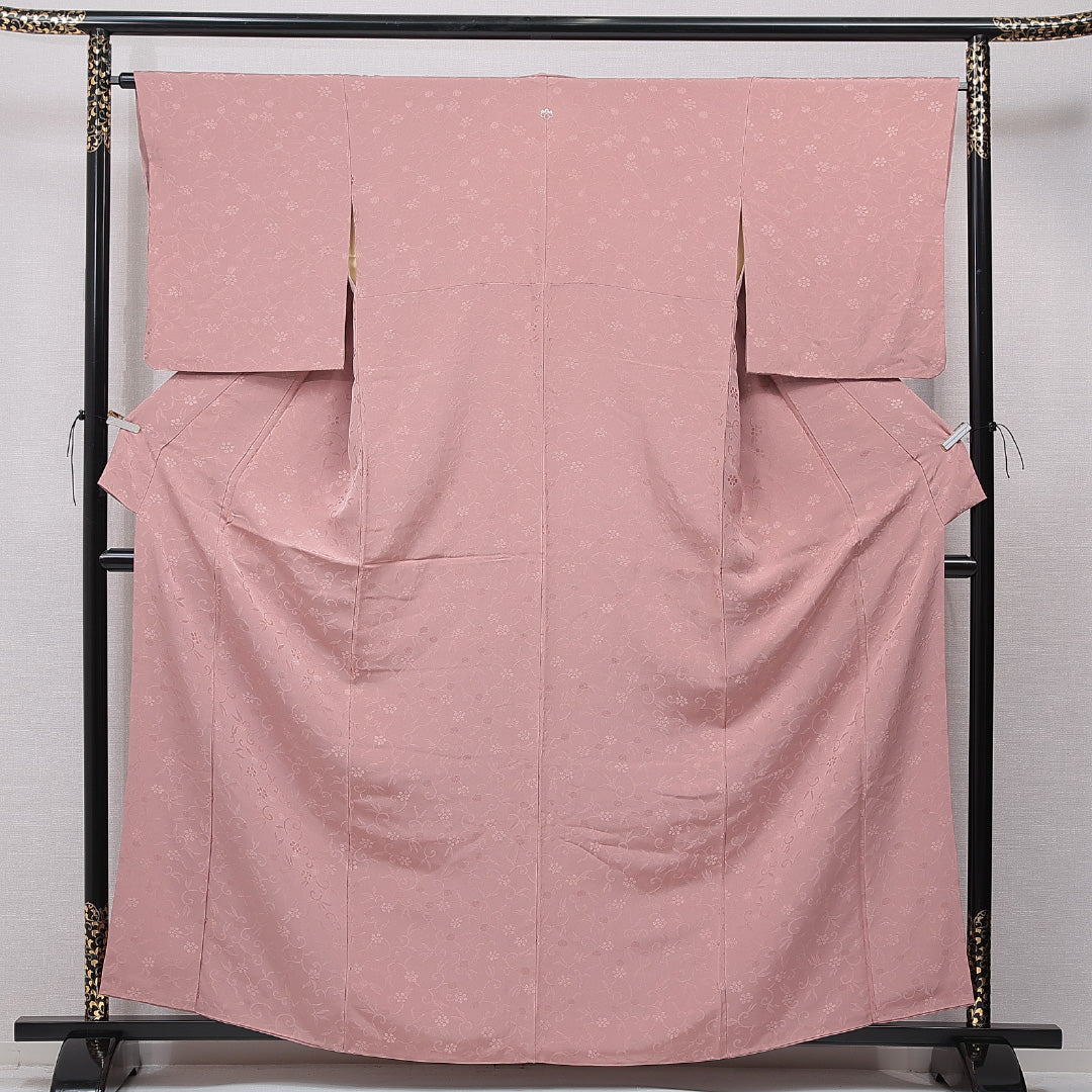 色無地 袷 身丈162cm 裄丈65cm 正絹 Aランク Lサイズ バチ衿 一つ紋（五三桐） セミフォーマル 紋意匠 梅鉢 織り出し ピンク系 1214-15650