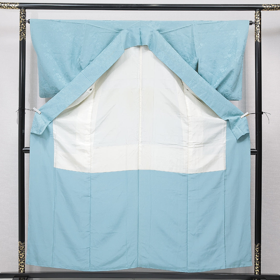 色無地 袷 身丈157cm 裄丈64cm 正絹 Bランク Mサイズ 広衿 一つ紋（橘） セミフォーマル 紋意匠 紅葉 無地 水色系 1214-15670