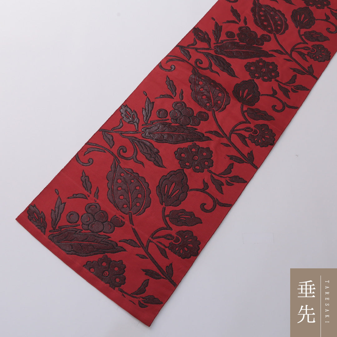九寸名古屋帯 帯丈326cm カジュアル 名古屋仕立て 六通 Dランク 正絹 植物柄 赤系 1224-03287