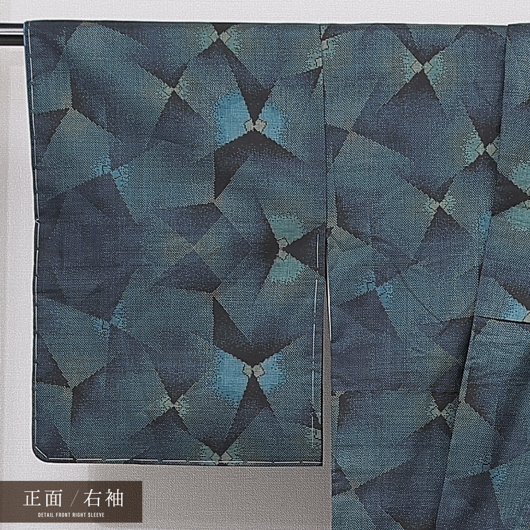 未使用品 大島紬 袷 身丈164cm 裄丈65cm 正絹 Nランク インフォーマル 広衿 Lサイズ 経緯絣 ガード加工 しつけ糸 幾何学柄 青系 PO 1223-15044