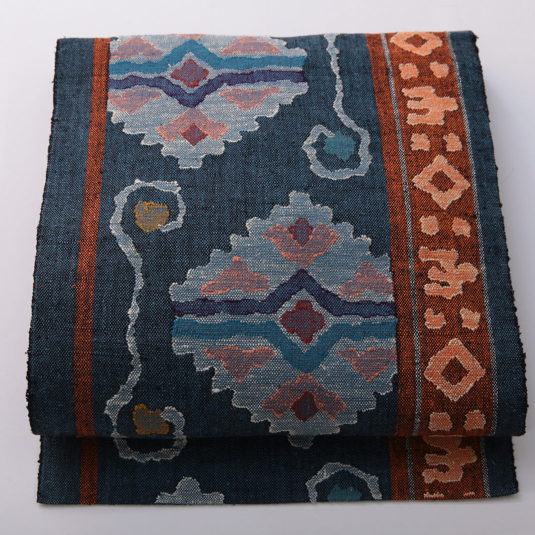 八寸名古屋帯（紬） 帯丈340cm カジュアル 名古屋仕立て 六通 帯芯なし Sランク 正絹 創作柄 紺系 1224-03495