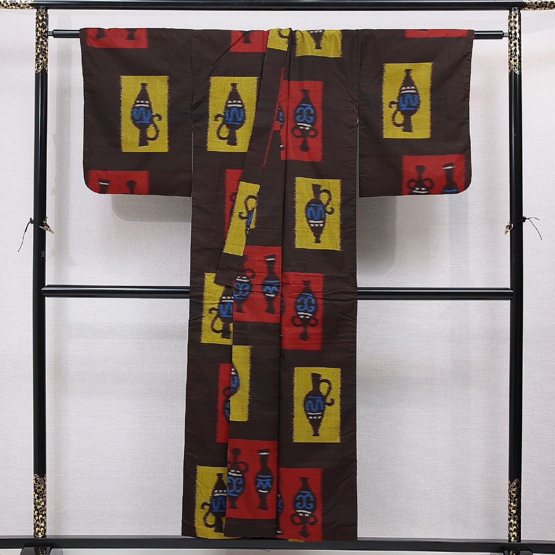 アンティーク 紬（銘仙） 袷 身丈151cm 裄丈64cm 正絹 Cランク Sサイズ バチ衿 壺 茶系 1216-15533