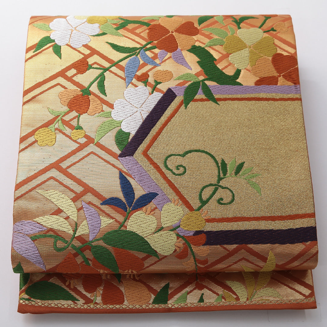 新古品 袋帯 帯丈428cm 珀寿錦 セミフォーマル 六通 Nランク 正絹 植物柄 落款 しつけ糸 青系 1223-02082