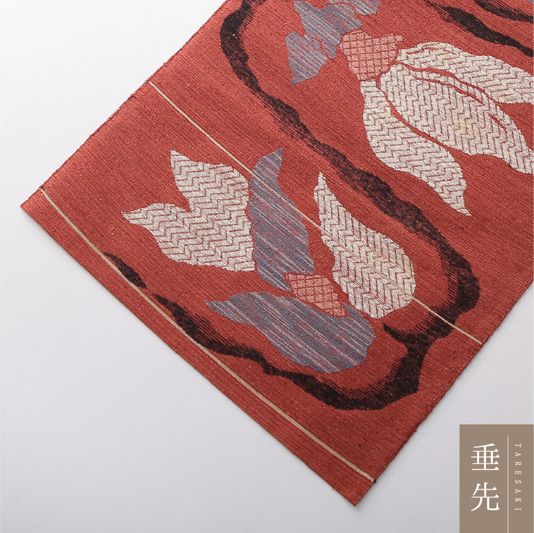 八寸名古屋帯（紬） 帯丈348cm カジュアル 松葉仕立て 六通 Cランク 正絹 花柄 赤系 朱系 1224-03820